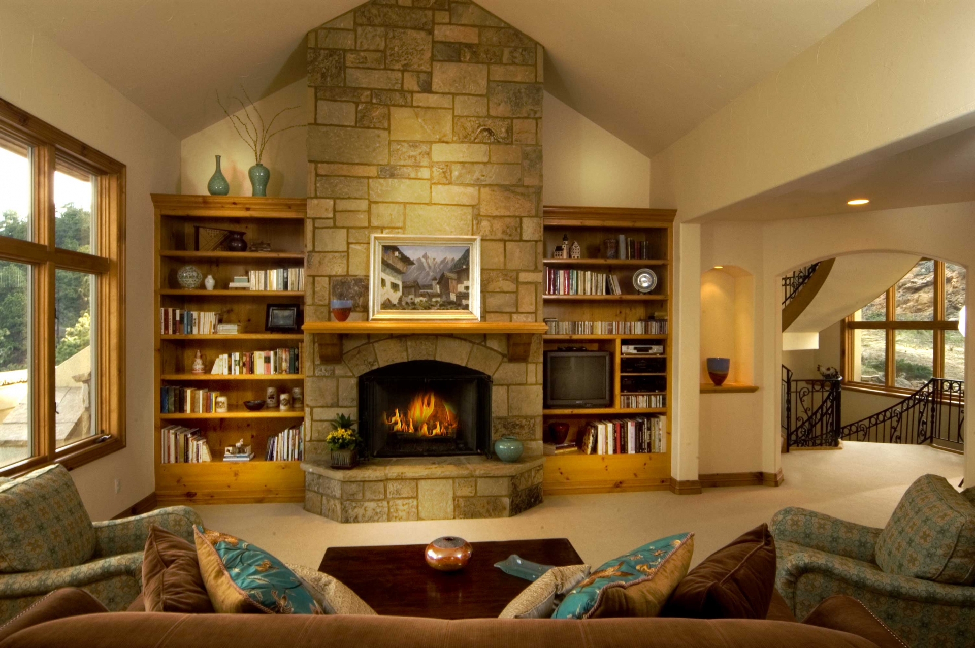 The idea of ​​a fireplace in the living room of a country house