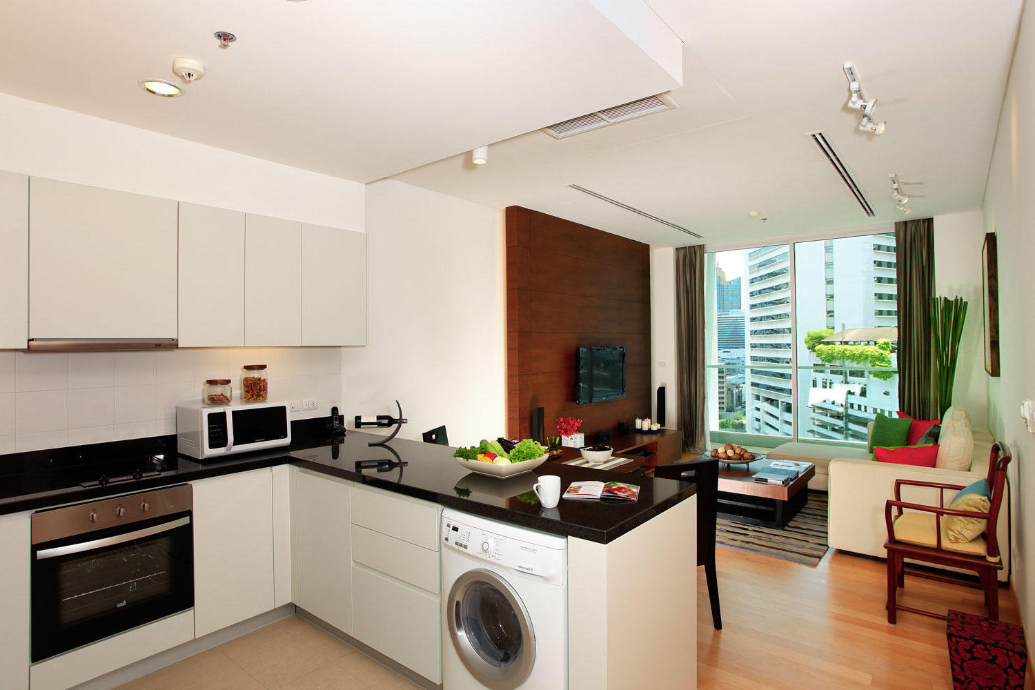 Small bright kitchen-living room in a stylish design