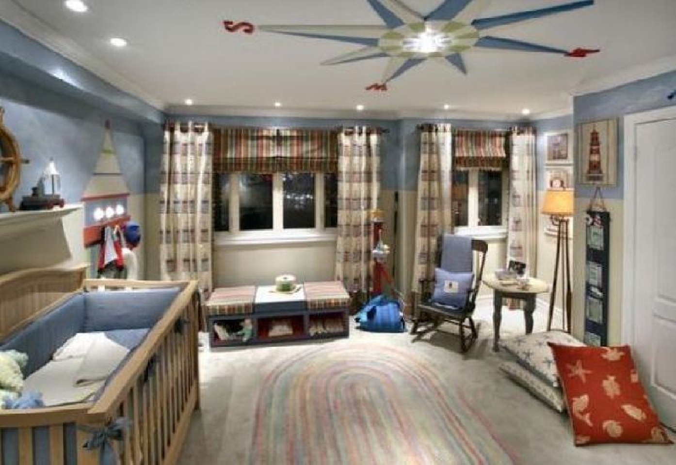 Bright children's room in a classic marine style for a little boy