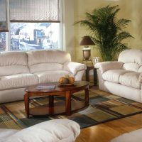 bright sofa in the interior of the apartment photo