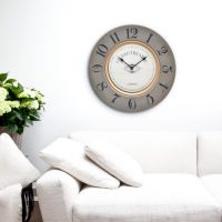 metal clock in the corridor in the style of minimalism photo