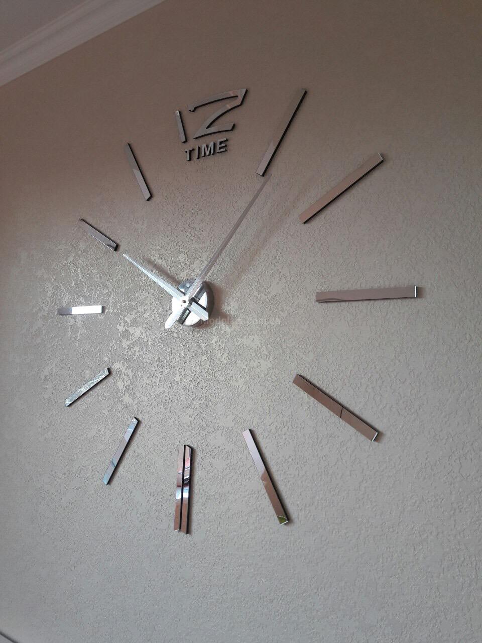 wooden clock in a high-tech kitchen