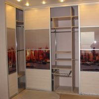 interior of the corner wardrobe in the bedroom made of wood picture