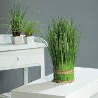 artificial flowers in the interior of the apartment photo