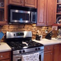 bright apron made of standard format tiles with a pattern in the style of the kitchen picture