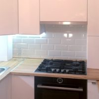 beautiful white kitchen design with a touch of green picture