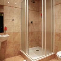 beautiful interior of a bathroom with a shower in bright colors photo