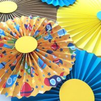 paper fan in bedroom design photo