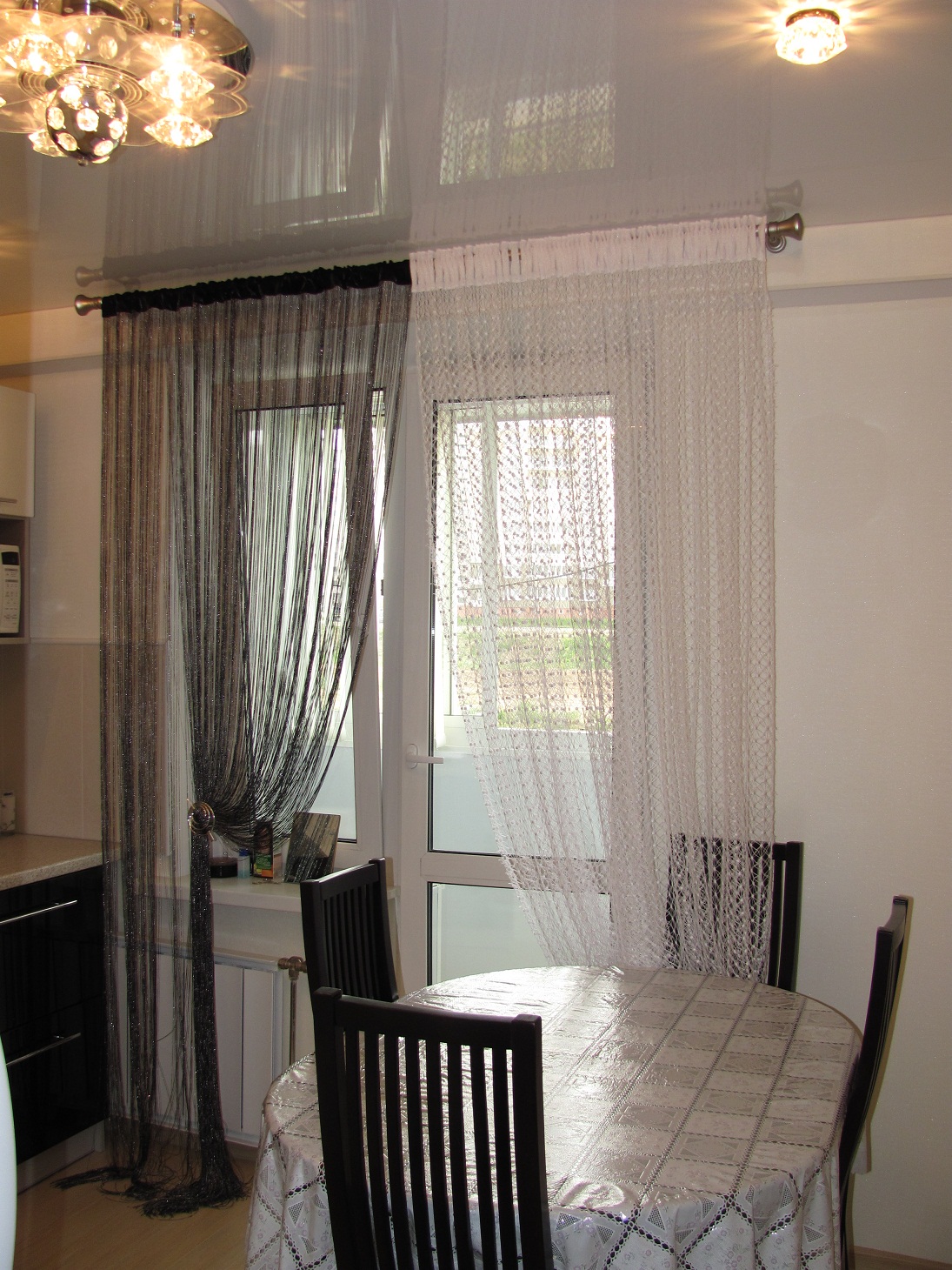 bright filament curtains in the interior of the kitchen