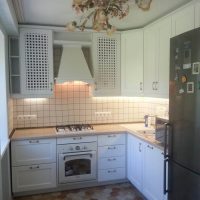 beautiful style of white kitchen with a touch of blue photo