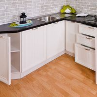 beautiful design of a white kitchen with a touch of pink photo