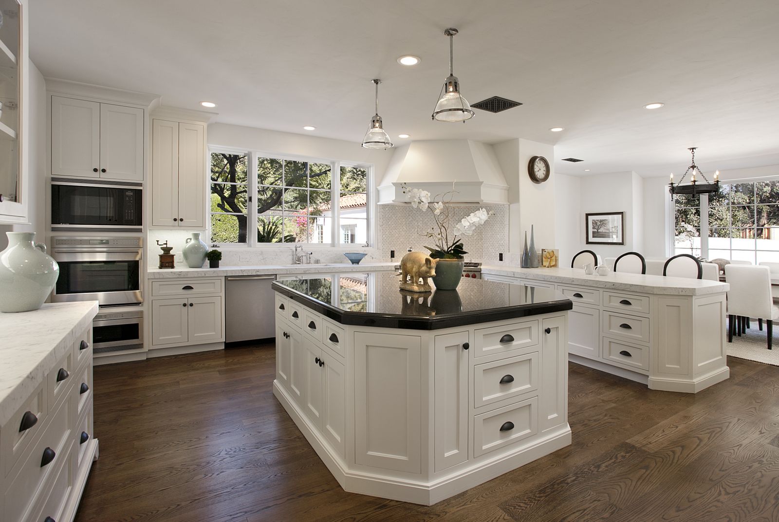 light white kitchen design with a touch of green