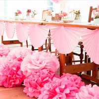 white paper flowers in the design of the photo hall