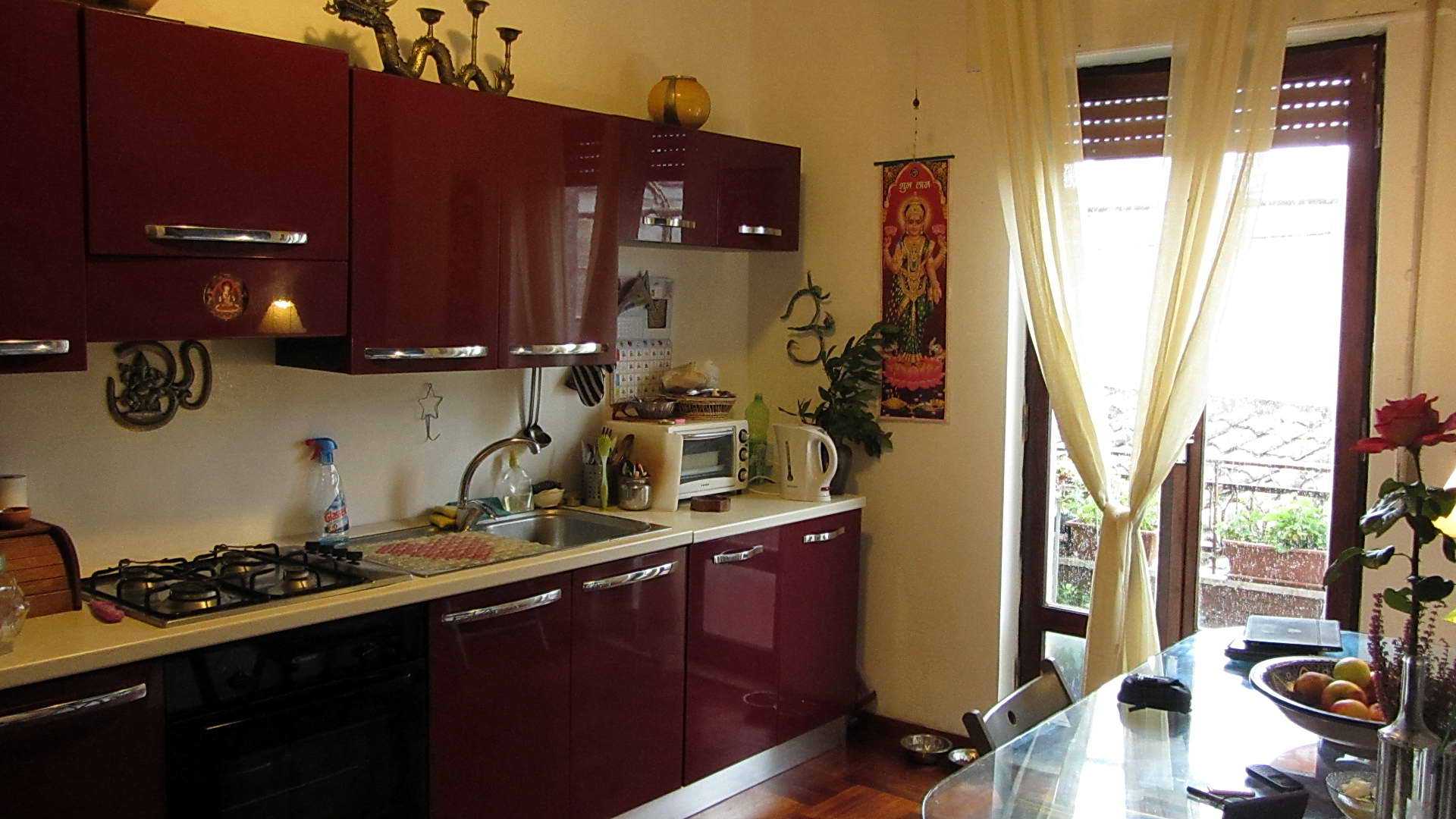 rich burgundy color in the bedroom interior