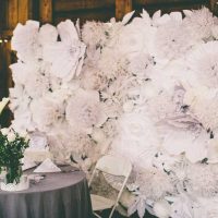 white paper flowers in the facade of the festive hall photo