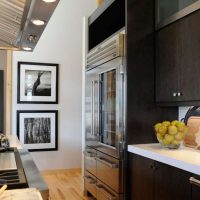 a large refrigerator in the style of the kitchen in steel color picture