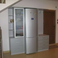 large refrigerator in the decor of the kitchen in multi-colored color photo