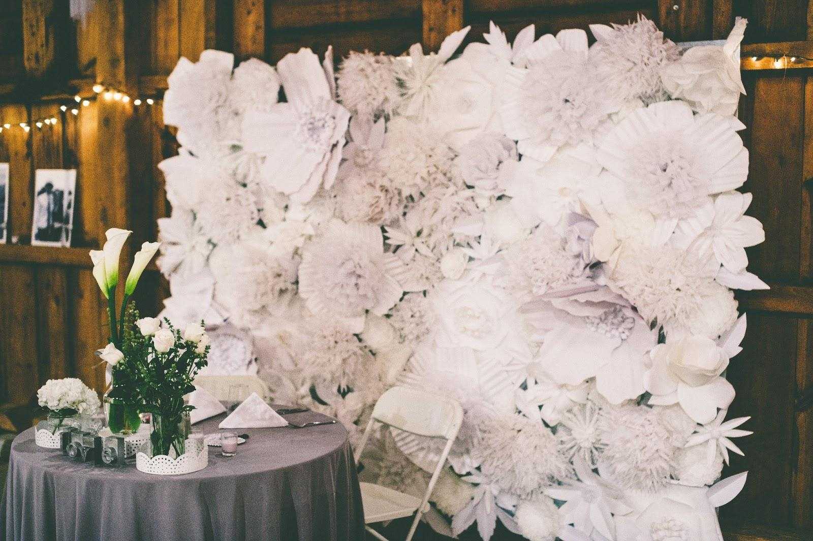 blue paper flowers in the decor of the festive hall