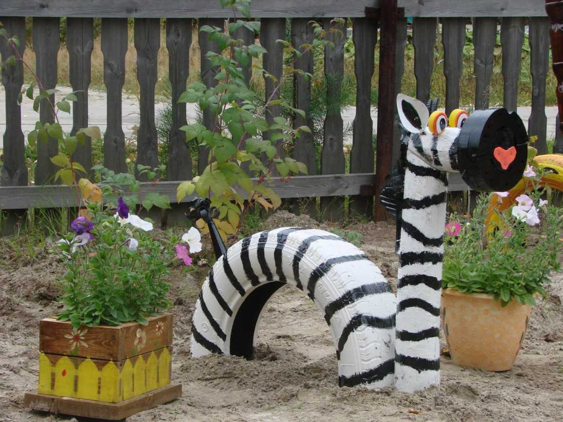 bright decoration of the garden plot with improvised materials