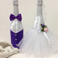 beautiful decoration of champagne bottles with colorful ribbons picture