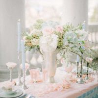 original decoration of the wedding hall with flowers photo