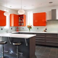 a combination of bright orange in the interior of the living room with other colors