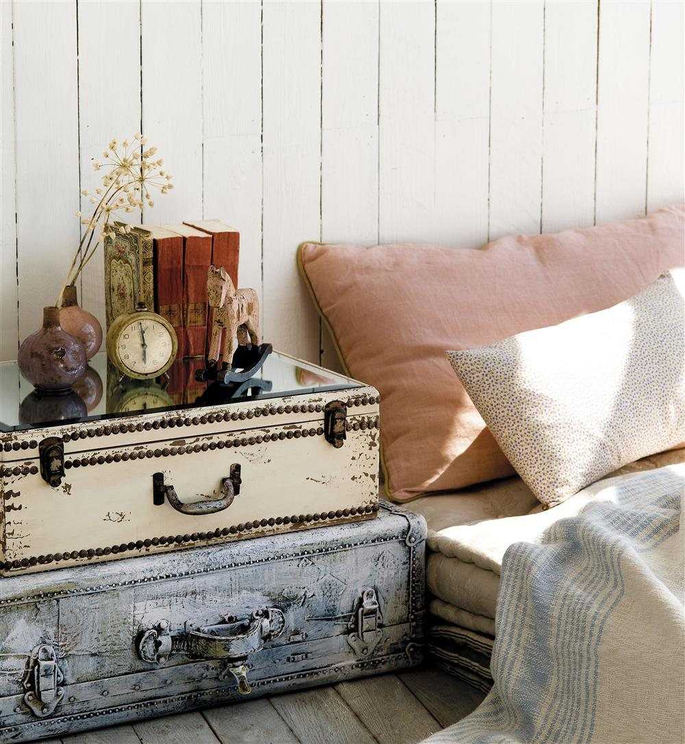 bright bedroom design with old suitcases