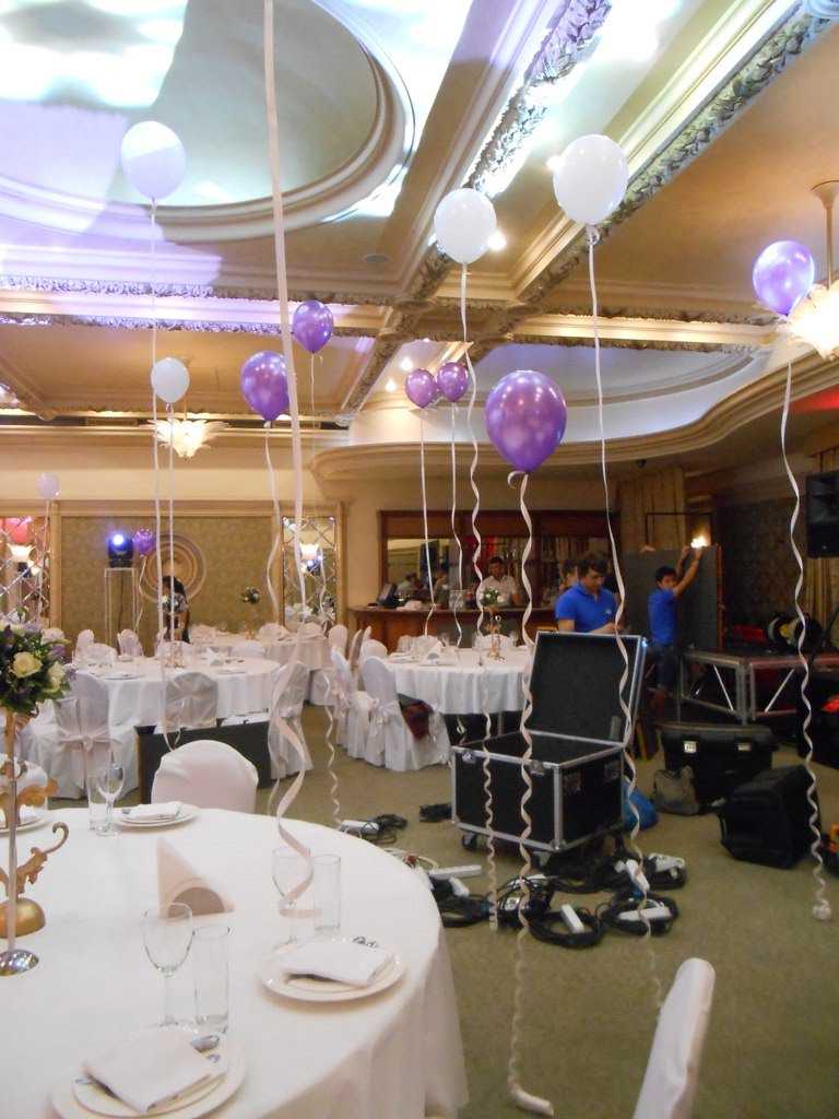 bright decoration of the wedding hall with flowers