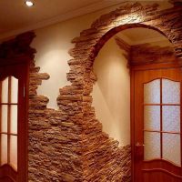 the idea of ​​a bright decorative stone in the design of the photo room