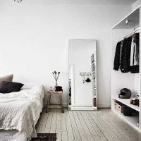 l'idea di un'elegante decorazione della foto in stile camera da letto