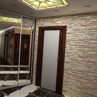 the idea of ​​the original decorative stone in the interior of the room picture