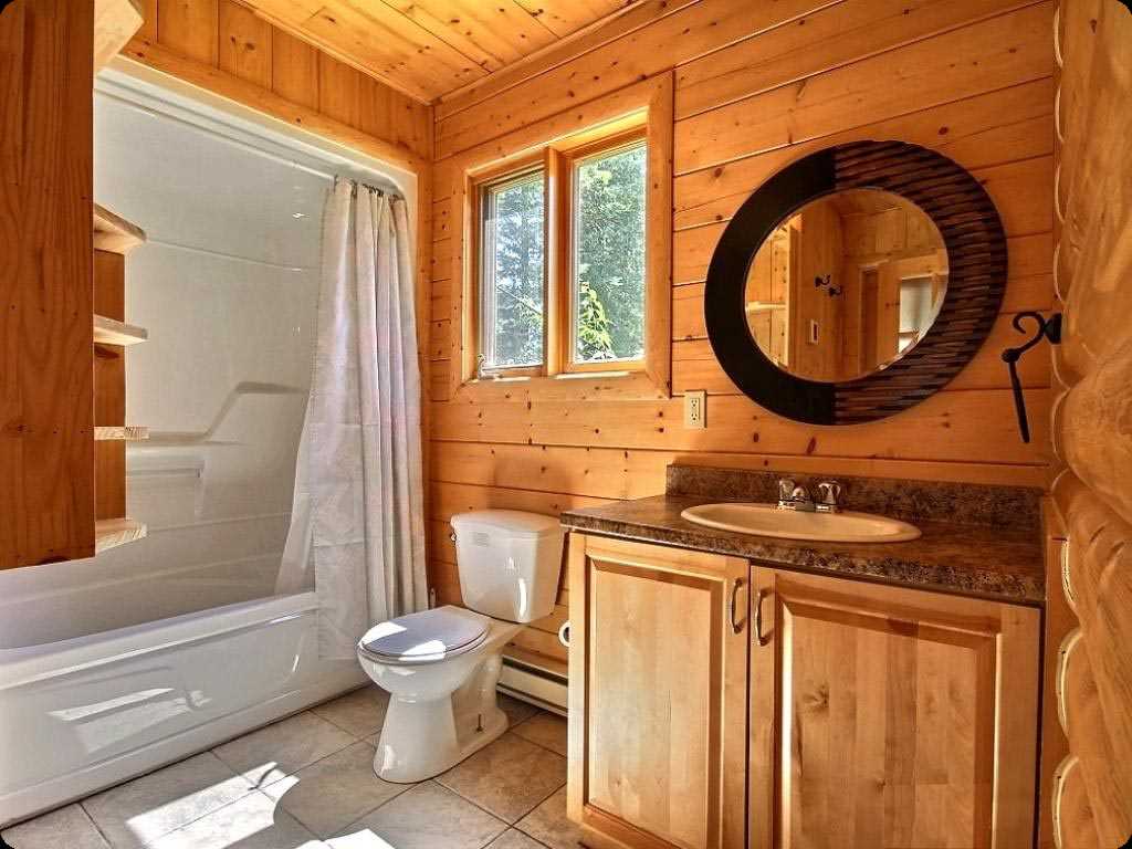 idea di design moderno di un bagno in una casa di legno