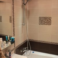 An example of a bright bathroom interior in beige color photo