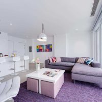 an example of a light living room interior in the style of minimalism photo