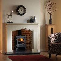 An example of a bright living room interior with a fireplace picture