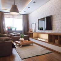 example of a beautiful design of a living room 16 sq.m photo