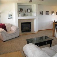 version of the bright interior of the living room with fireplace picture