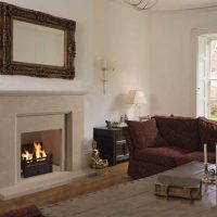 variant of the bright decor of the living room with fireplace photo