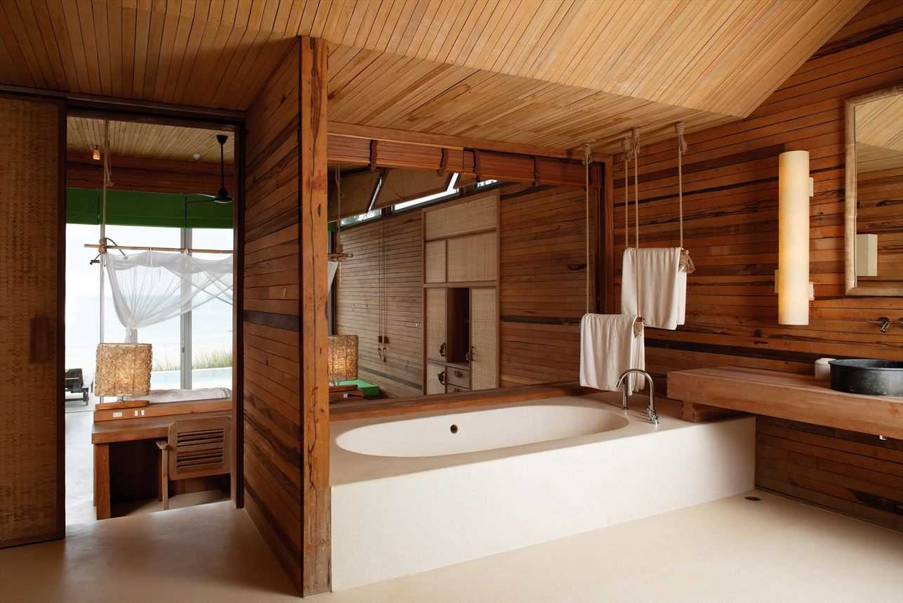 version of the modern bathroom interior in a wooden house