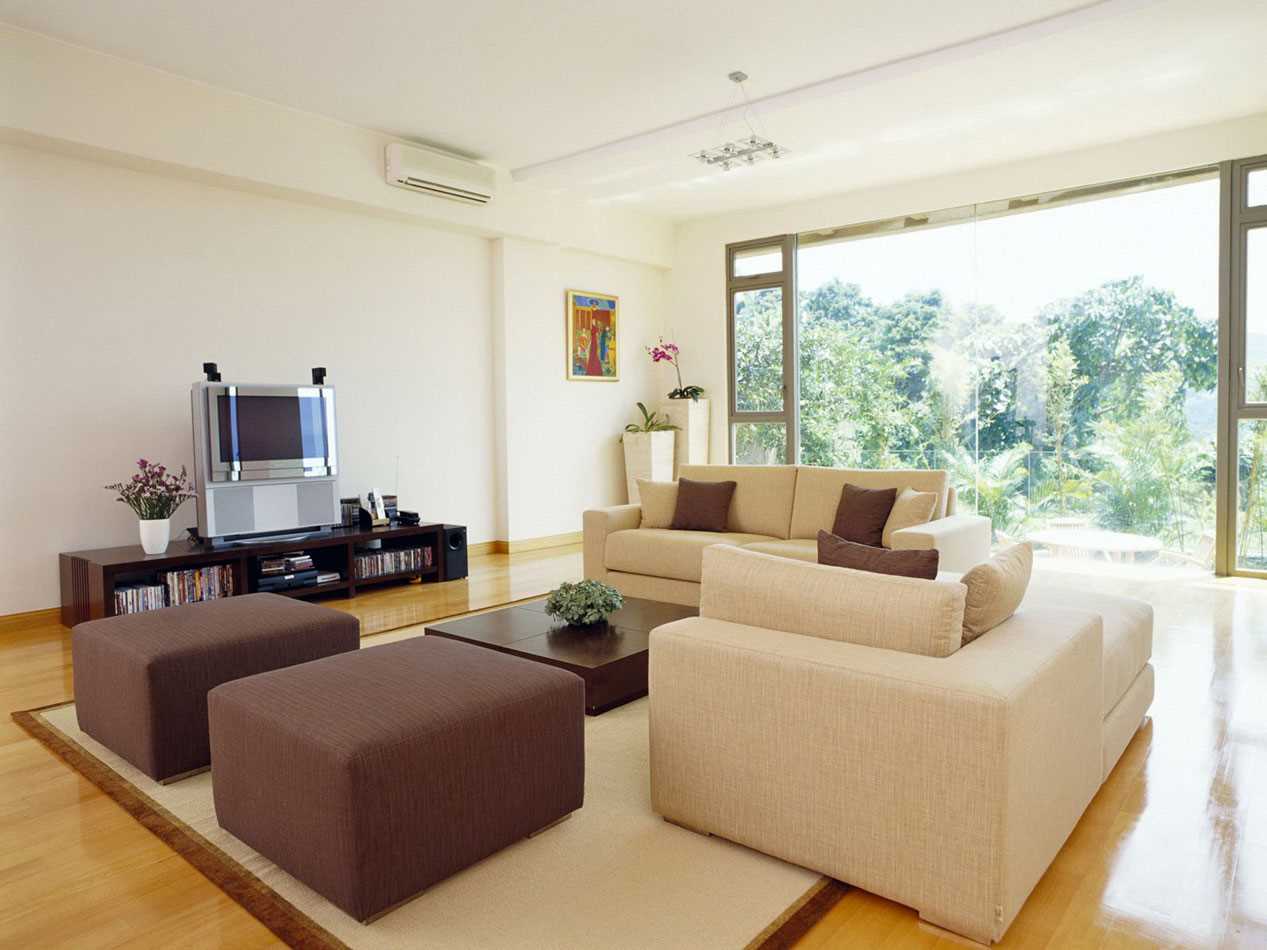 idea of ​​a bright decor of a living room in a private house