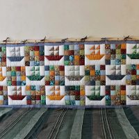 a folyosó gyönyörű dekorációjának ötlete a patchwork fotó stílusában