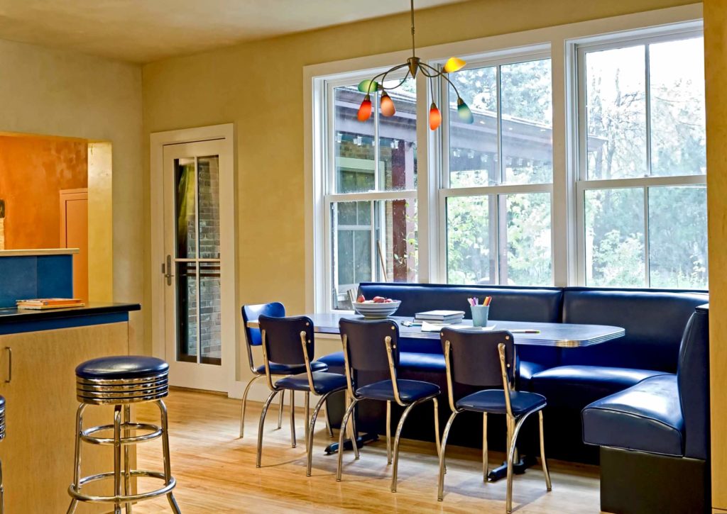 sofa in the kitchen by the window