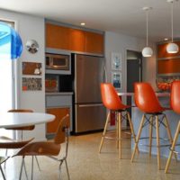 bar counter with red chairs