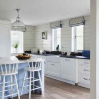 an example of an unusual style of a rustic kitchen photo