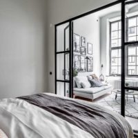 An example of a bright interior of a living room bedroom photo