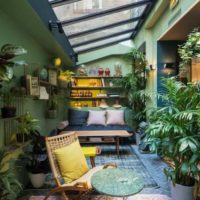 possibilità di utilizzare bellissime idee per decorare un giardino d'inverno in una foto di casa