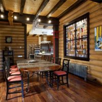 variant of a beautiful kitchen interior in a wooden house photo