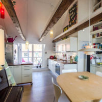 kitchen combined with a balcony in the interior