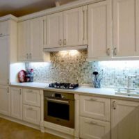 An example of a bright kitchen decor in a classic style photo