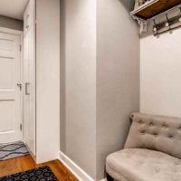 example of a bright style of a hallway in a private house photo